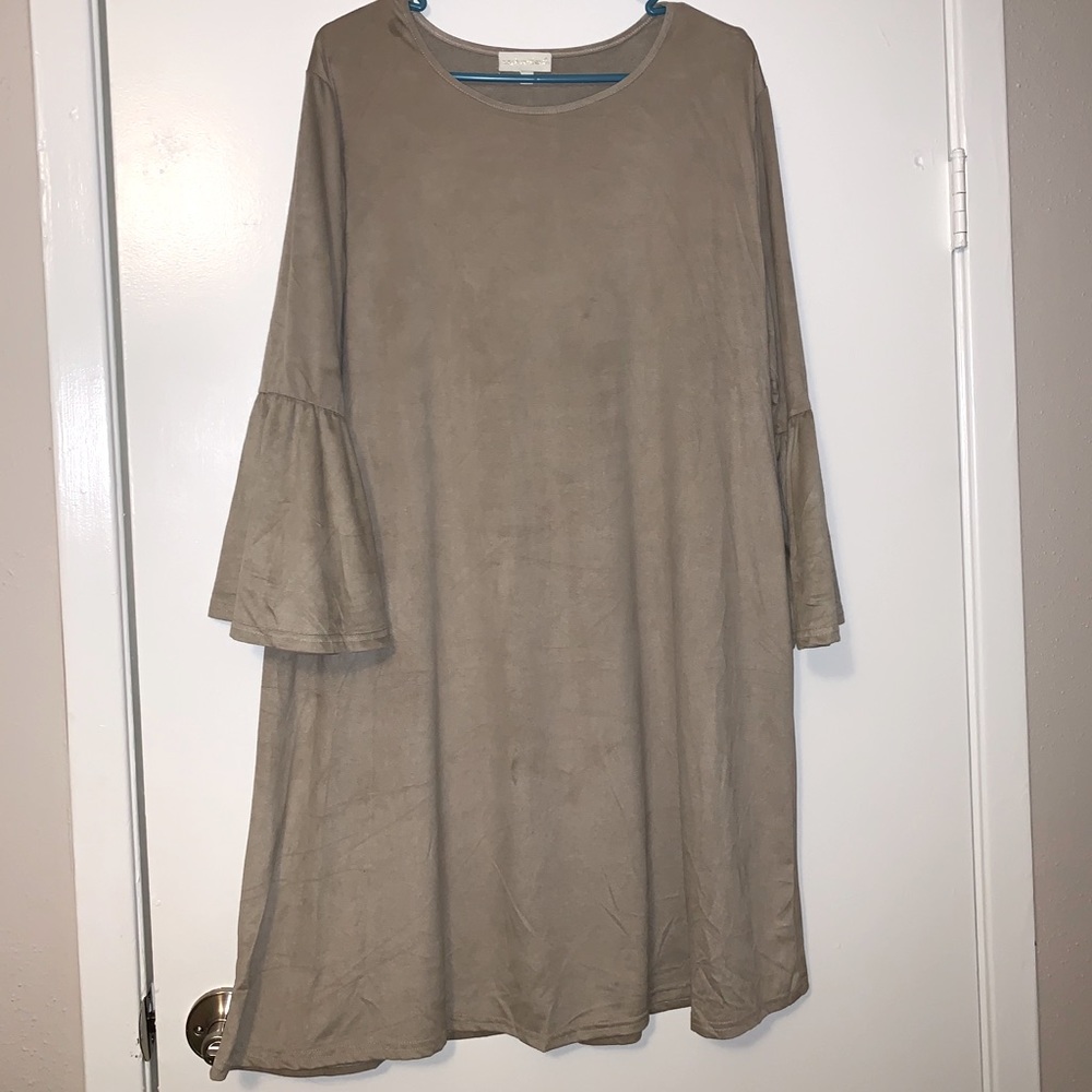 Super stylish suede dress.